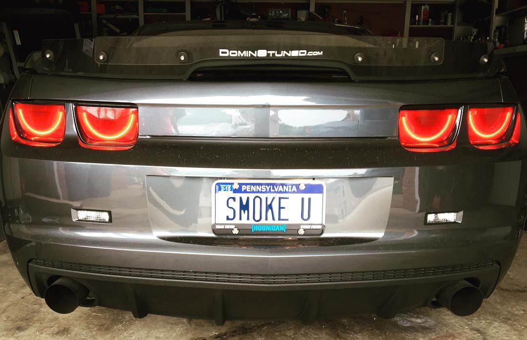 Rear end of a Chevrolet Camaro with Afterburner Tail Light halos installed.