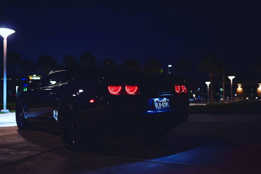 Rear three quarters view of a Chevrolet Camaro with Afterburner Tail Light halos installed.