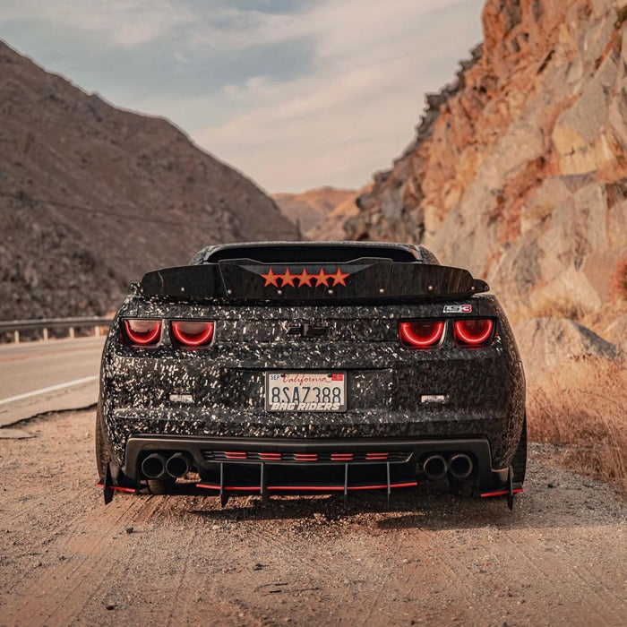 Rear end of a Chevrolet Camaro with Afterburner Tail Light halos installed.