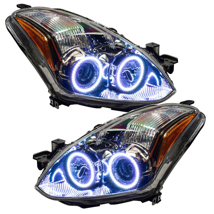 Nissan Altima headlights with white LED halo rings.