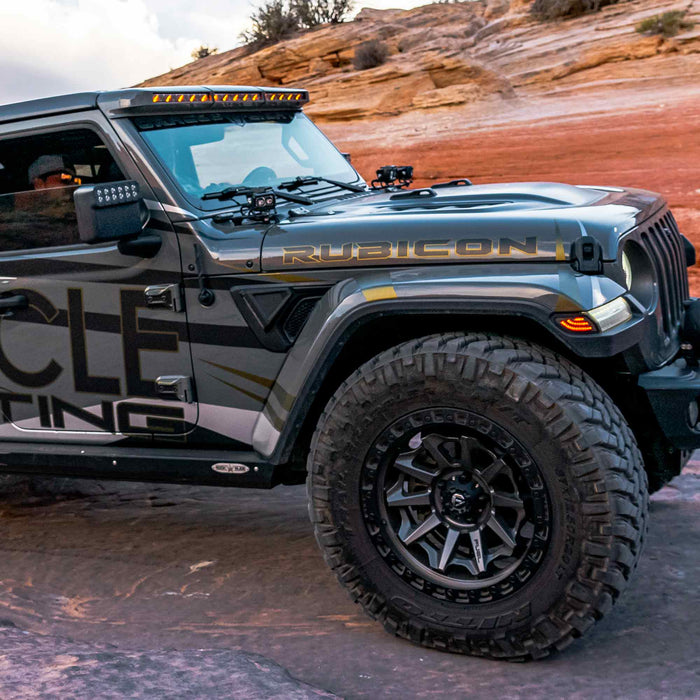 Side view of a Jeep Gladiator JT equipped with multiple LED lighting products, including the Sidetrack LED Lighting System.