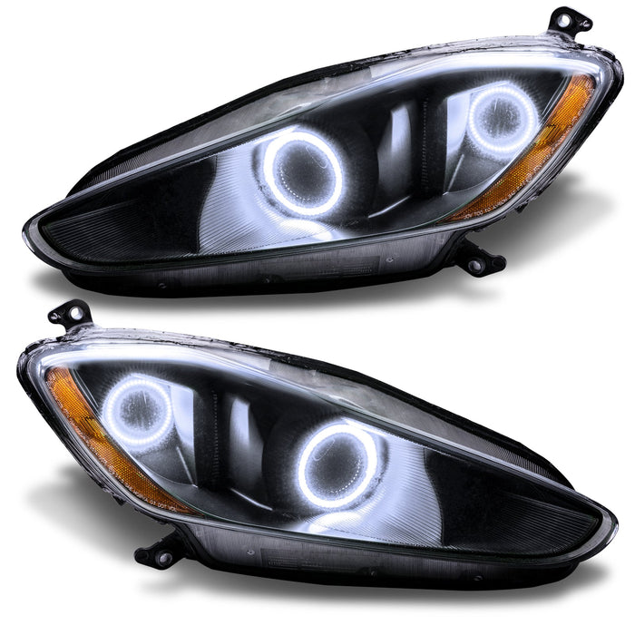 Maserati GranTurismo headlights with white halo rings.
