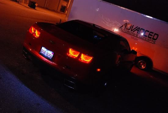 Rear end of a Chevrolet Camaro with Afterburner Tail Light halos installed.