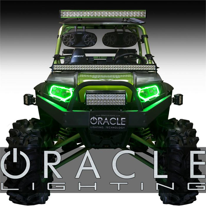 Front view of a Polaris RZR with green headlight halos installed.