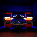 Rear end of an Ultima GTR with Surface Mount Tail Light Halo Kit installed.