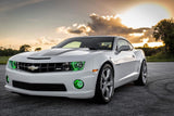 Three quarters view of a Chevrolet Camaro with green LED headlight and fog light halo rings installed.