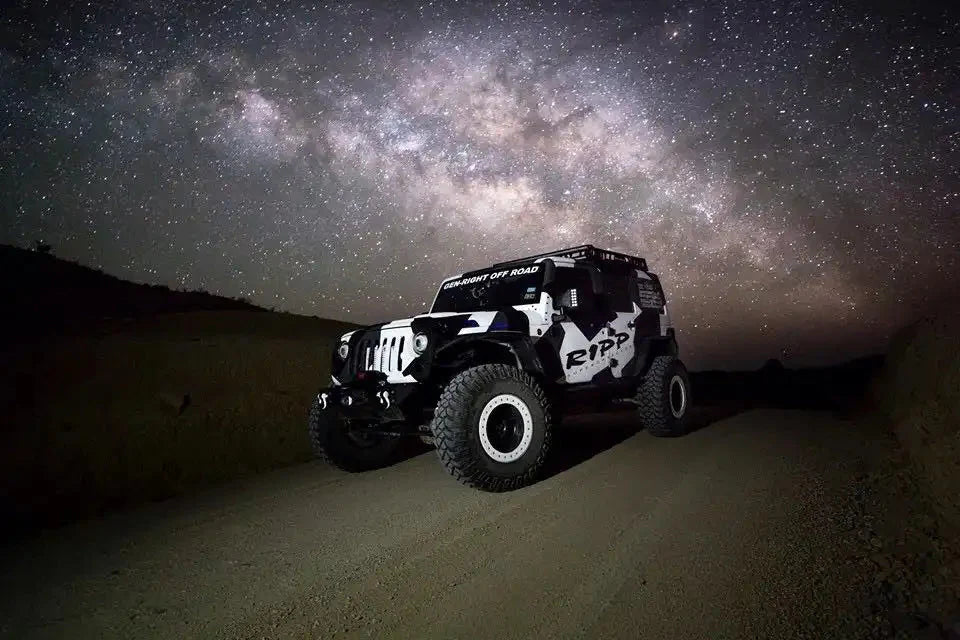 Three quarters view of a Jeep Wrangler JK with LED Off-Road Side Mirrors installed.