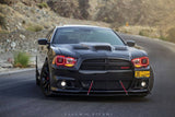 Front view of a black Dodge Charger with red LED headlight halo rings installed.