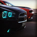 Close-up of black charger with cyan halos.