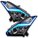 Nissan GT-R headlights with cyan DRLs.