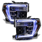 GMC Sierra headlights with white DRLs.