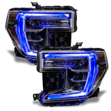 GMC Sierra headlights with blue DRLs.