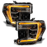 GMC Sierra headlights with amber DRLs.