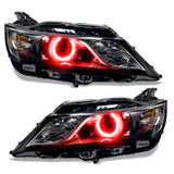 Chevrolet Impala headlights with red halo rings.