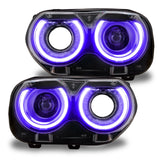 Dodge Challenger headlights with purple DRLs.