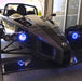 Ariel Atom with blue headlight halos.