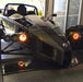 Ariel Atom with amber headlight halos.