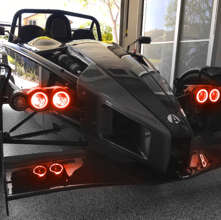 Ariel Atom with amber headlight halos.