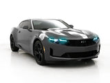 Three quarters view of a Chevrolet Camaro with cyan headlight DRLs.