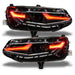 Chevrolet Camaro headlights with red DRLs.