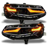 Chevrolet Camaro headlights with amber DRLs.