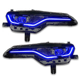 Chevrolet Camaro headlights with blue DRLs.