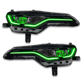 Chevrolet Camaro headlights with green DRLs.