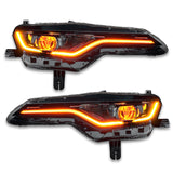 Chevrolet Camaro headlights with amber DRLs.