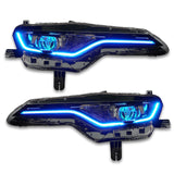 Chevrolet Camaro headlights with cyan DRLs.