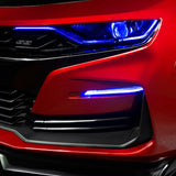 Close-up on a red Chevrolet Camaro with blue fog light DRLs.