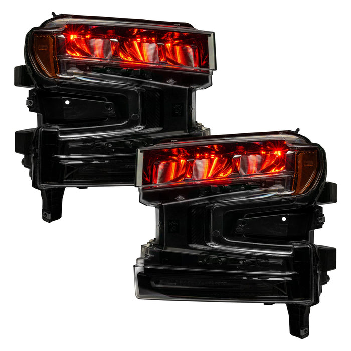 Chevrolet Silverado 1500 headlights with red demon eye projectors.