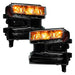 Chevrolet Silverado 1500 headlights with amber demon eye projectors.