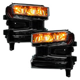 Chevrolet Silverado 1500 headlights with amber demon eye projectors.