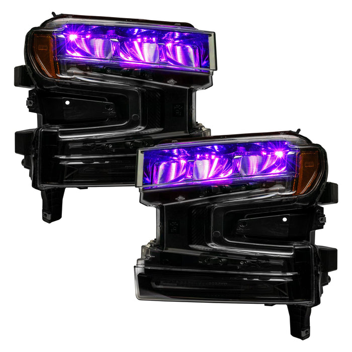 Chevrolet Silverado 1500 headlights with purple demon eye projectors.
