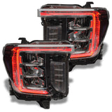 GMC Sierra headlights with red DRLs.