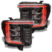 GMC Sierra headlights with red DRLs.