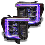 GMC Sierra headlights with purple DRLs.