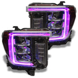 GMC Sierra headlights with pink DRLs.