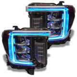 GMC Sierra headlights with cyan DRLs.