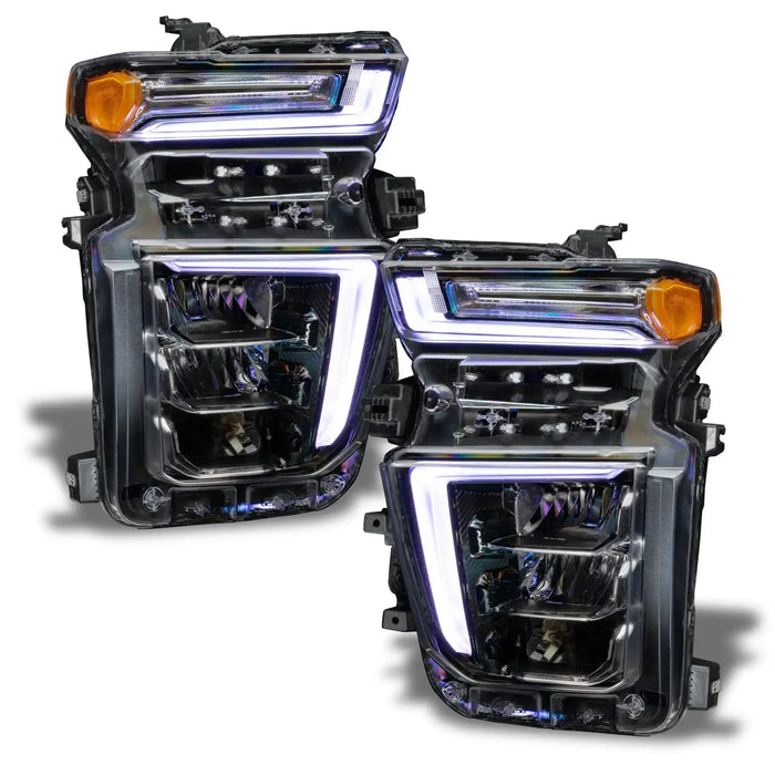 Chevrolet Silverado headlights with white DRLs.