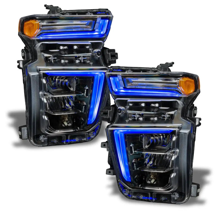 Chevrolet Silverado headlights with blue DRLs.