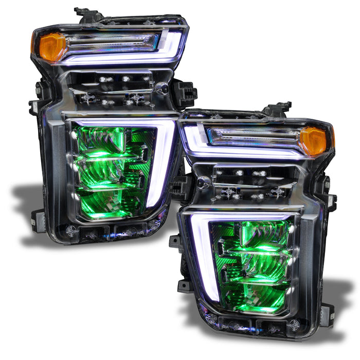 Chevrolet Silverado headlights with green demon eye projector.