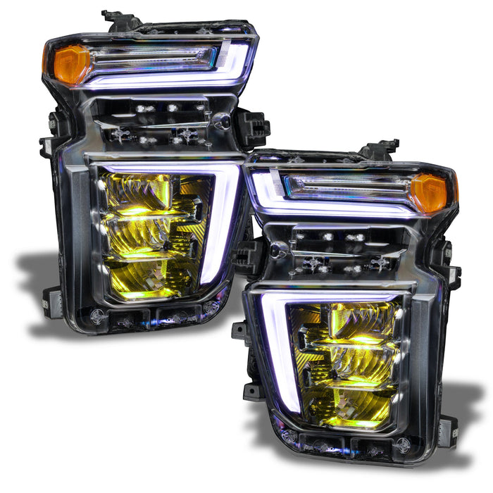 Chevrolet Silverado headlights with yellow demon eye projector.