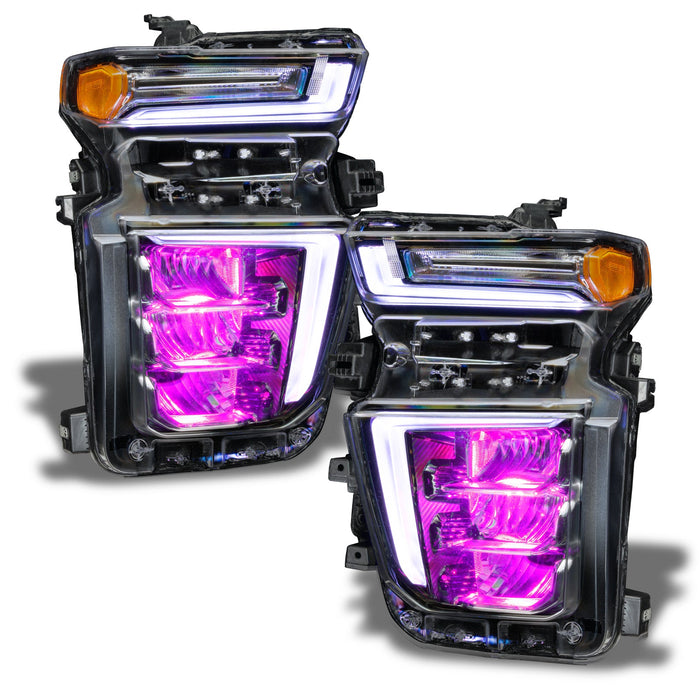 Chevrolet Silverado headlights with pink demon eye projector.