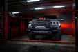 Front view of a Ram 1500 with white headlight DRLs and white demon eye projectors.