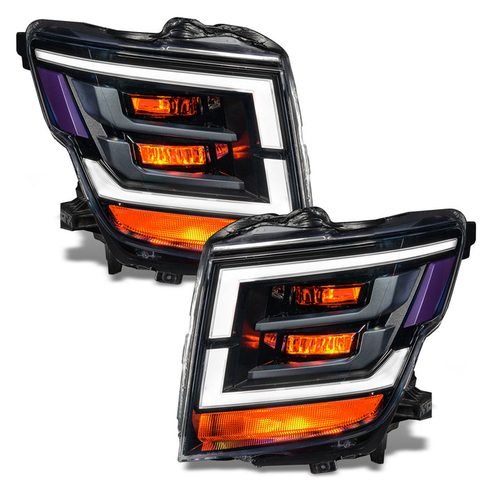 2021-2024 Nissan Titan headlights with amber demon eye projectors.