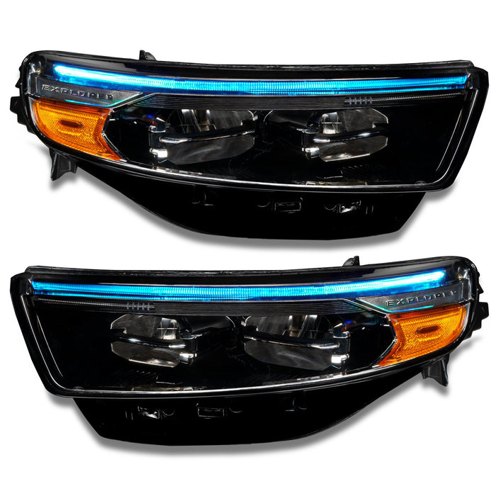 Ford Explorer headlights with cyan DRLs.