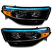 Ford Explorer headlights with cyan DRLs.