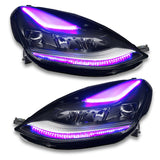 Tesla Model 3 headlights with purple DRLs.