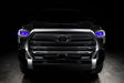  Straight front view of a black Toyota Tundra with purple demon eye projectors.